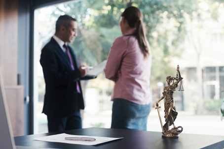 woman consulting with a lawyer